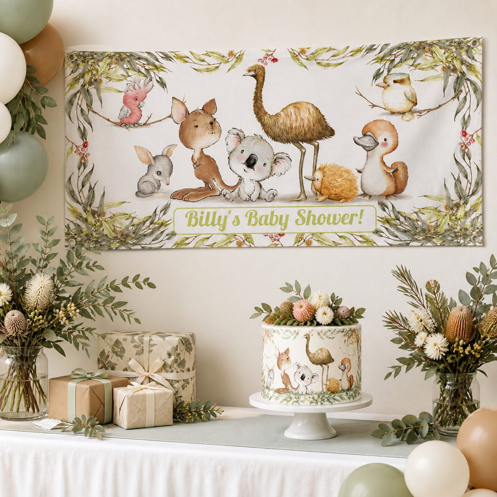 Australian animals baby shower dessert table with Billy’s personalised wildlife banner, cake, balloons and native floral decorations.