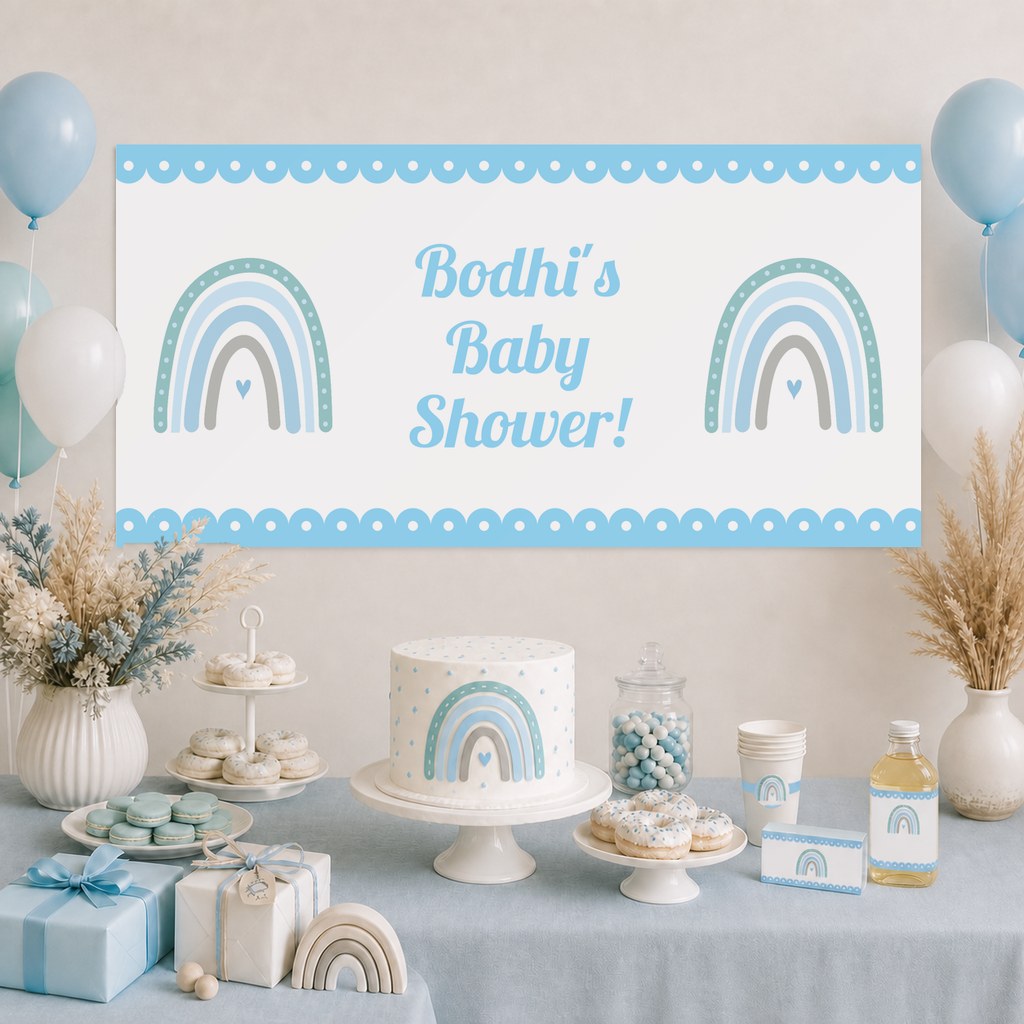 Blue Boho Rainbow Baby Shower Decorations with a personalised banner, coordinated cake, coordinated rainbow artwork, soft florals and matching table styling.