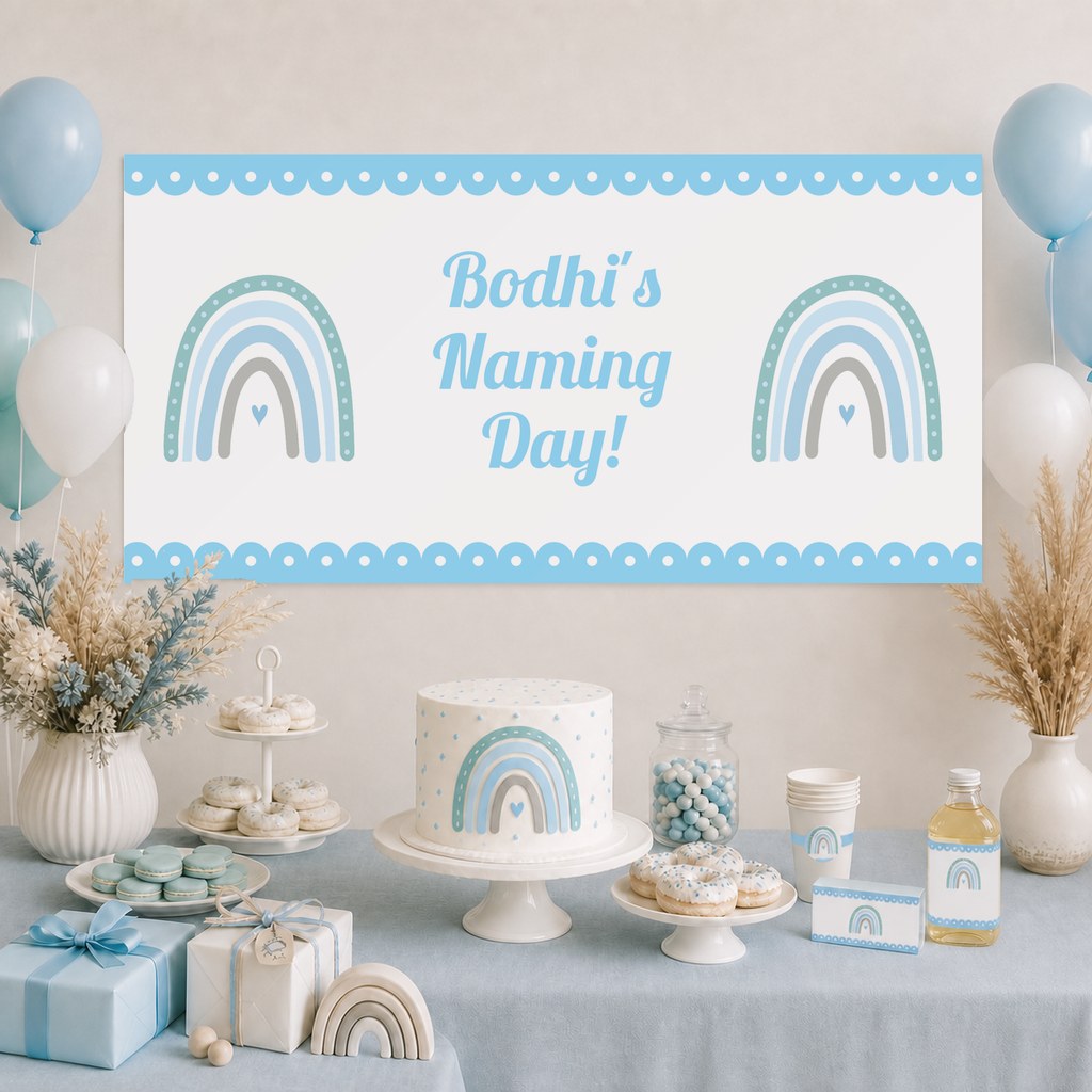 Boys Boho Rainbow Naming Day Decorations with a personalised banner, coordinated cake, coordinated rainbow artwork, soft florals and matching table styling.