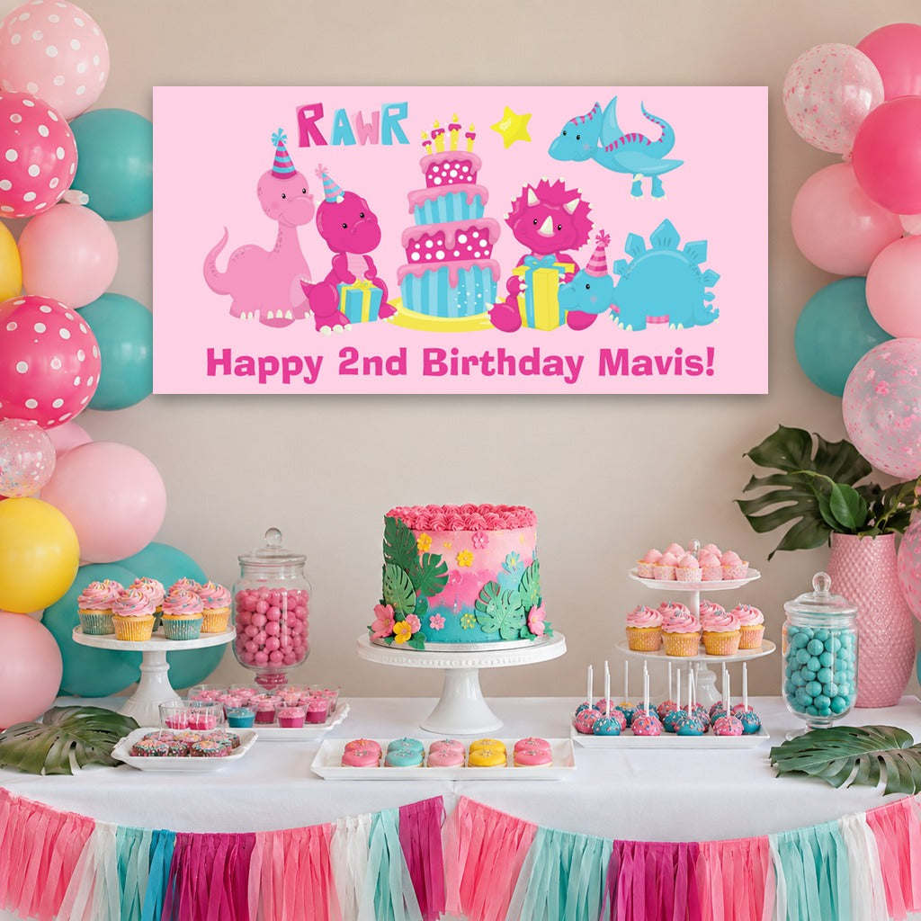 Little girls dinosaur birthday dessert table with Mavis's personalised pink banner, colourful cake, pink and turquoise balloons and matching decorations.