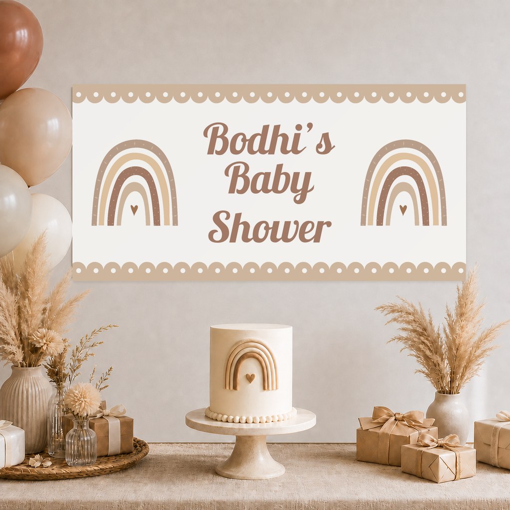 Neutral Boho Rainbow Baby Shower Decorations with a personalised banner, coordinated cake, coordinated rainbow artwork, soft florals and matching table styling.