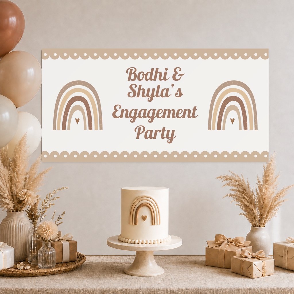 Neutral Boho Rainbow Engagement Party Decorations with a personalised banner, coordinated cake, coordinated rainbow artwork, soft florals and matching table styling.