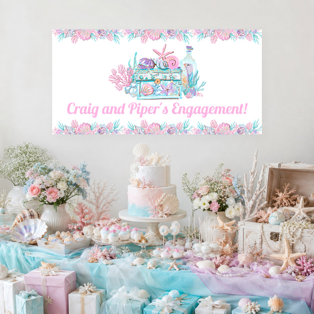 Ocean Treasure engagement dessert table with Craig and Piper's personalised banner, pastel cake, shells, coral and matching decorations.