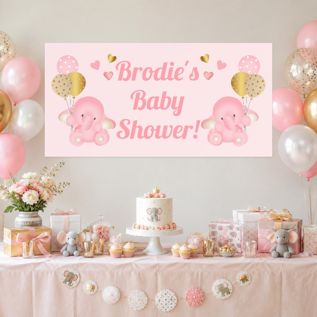Pink and gold baby elephant baby shower dessert table with Brodie's original personalised banner, cake, balloons and matching gifts.