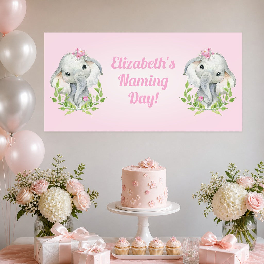 Pink Floral Elephant naming day decorations with Elizabeth's original personalised banner, a pink floral cake, cupcakes, pink and white balloons, roses and hydrangeas.
