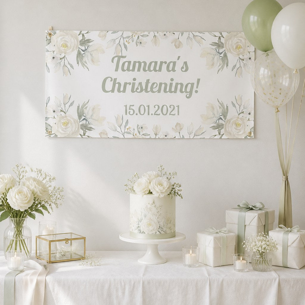 White floral christening setup with Tamara's personalised sage banner and matching floral cake