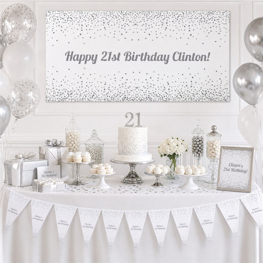 White and silver 21st birthday dessert table with Clinton’s personalised banner, cake, balloons and matching decorations.