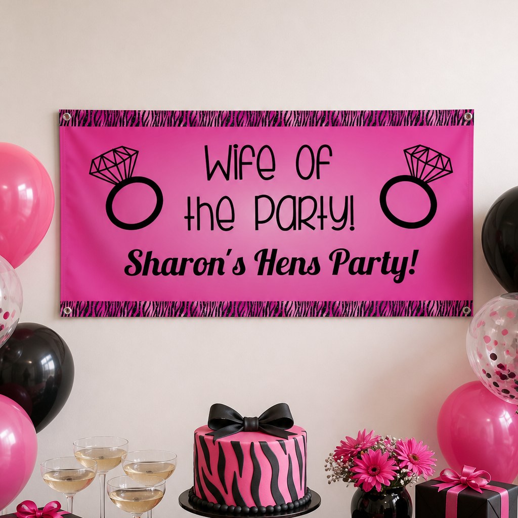 Wife of the Party hens party setup with Sharon's personalised hot pink and black banner and matching cake