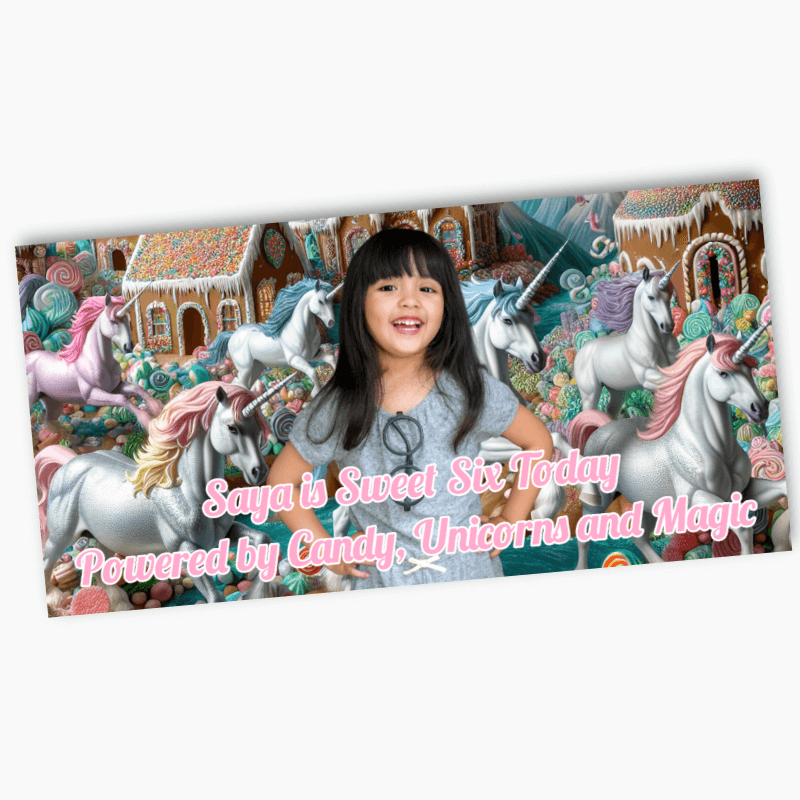 Birthday banner with a girl and candyland theme, featuring unicorns and text.