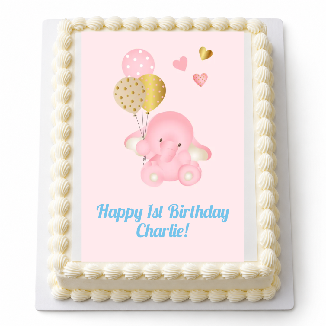 Personalised pink Baby Elephant A4 icing sheet on a cake