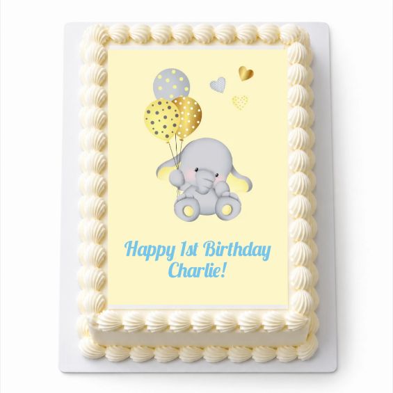 Personalised yellow Baby Elephant A4 rectangle icing sheet fitted on a white cake