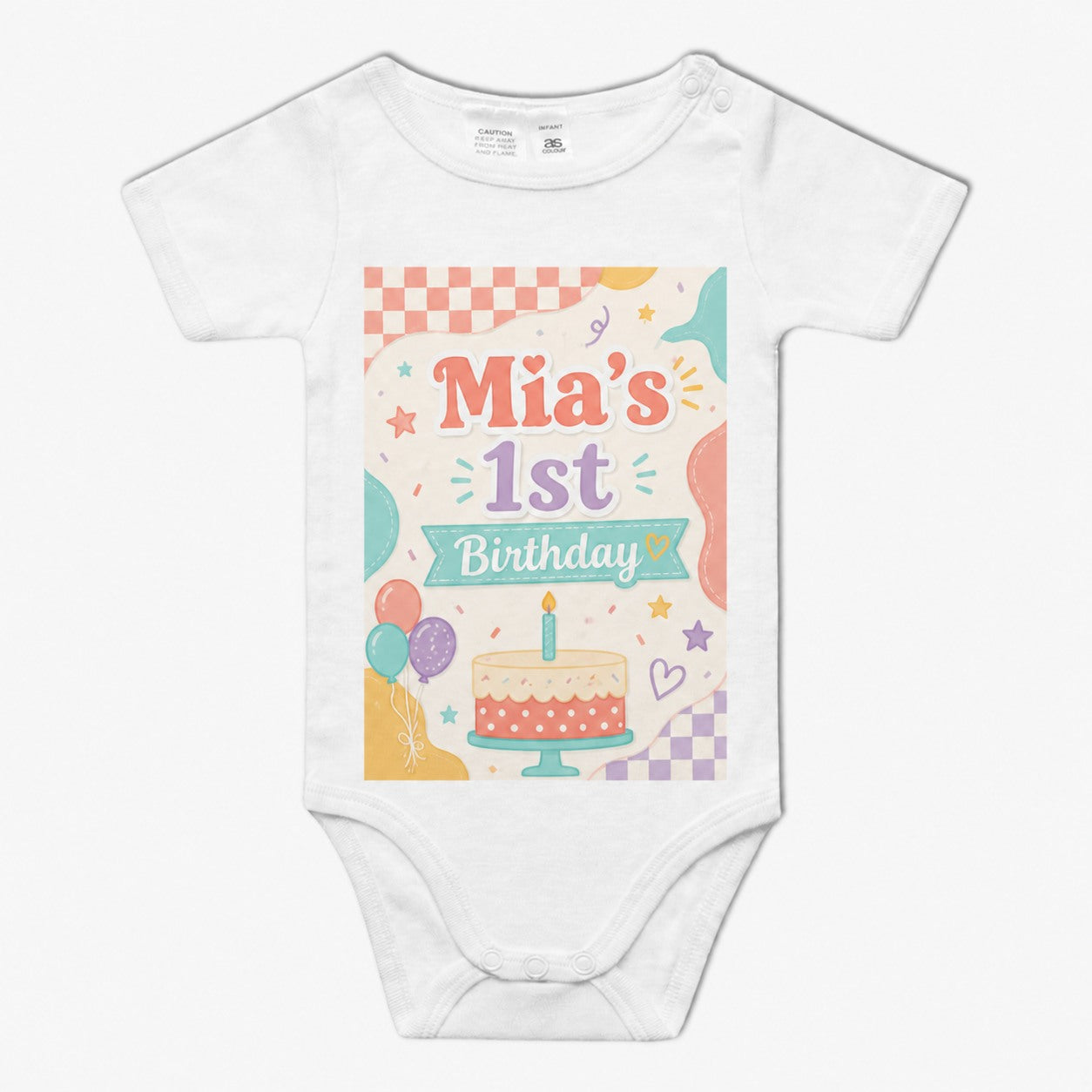 White baby romper with a pastel personalised first birthday cake design