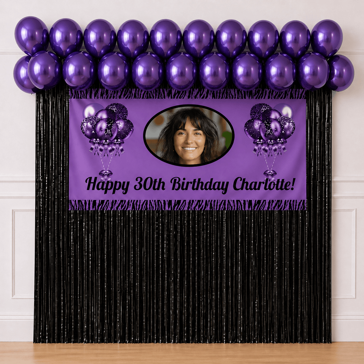 Purple and black personalised birthday banner with photo, purple balloons and black foil fringe curtain backdrop package
