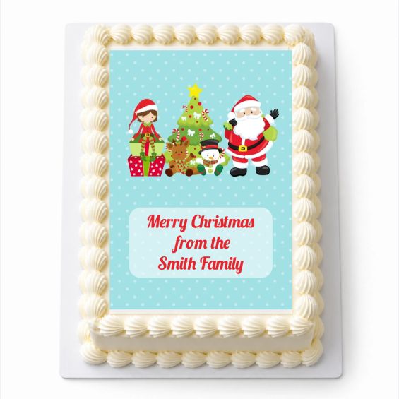 Personalised Santa and Friends Christmas A4 icing sheet fitted neatly to a white cake