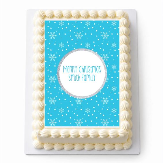 Personalised Winter Wonderland Christmas A4 icing sheet fitted to a white rectangular cake
